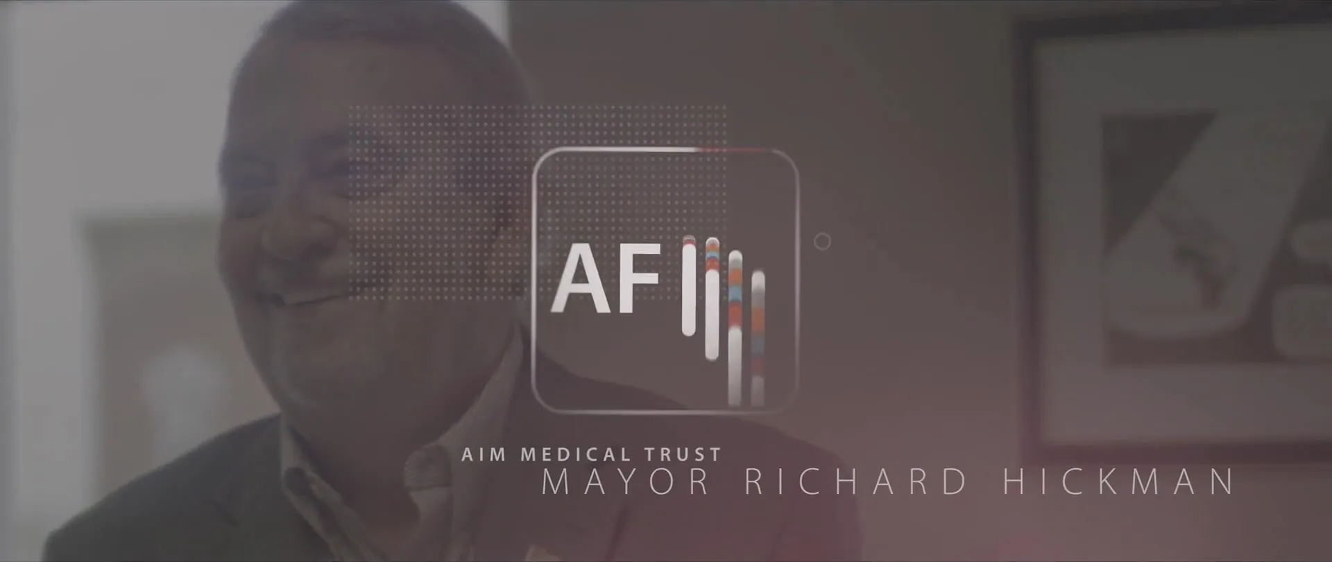 Animated lower-third graphic over an interview.